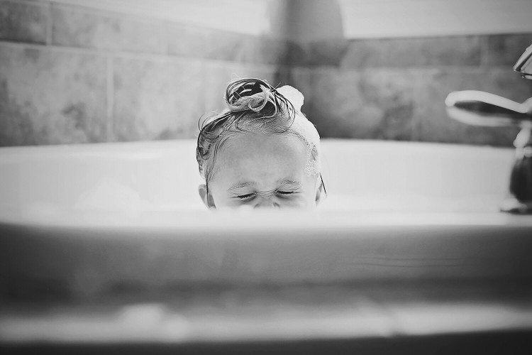 small child in a bathtub